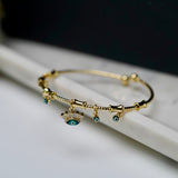 Crowned Evil Eye Charm Bracelet