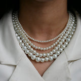 Four-Strand Graduated Layered Pearl Statement Necklace