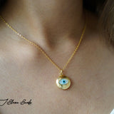 Gazing evil eye solid gold necklace