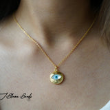 Gazing evil eye solid gold necklace