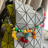 Happy Pop Bag Charm