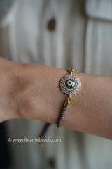 Circular Studded Evil Eye
