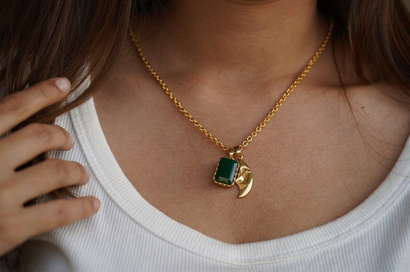 Gold chain hotsell with green stone