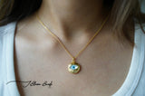 Gazing evil eye solid gold necklace